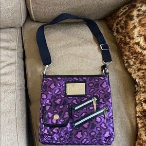 Betseyville cross chest carry purse gently used